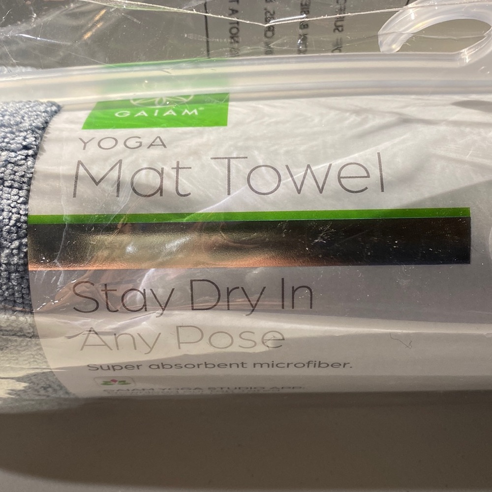 Gaiam Yoga mat towel. Stay dry in any pose.  Brand new